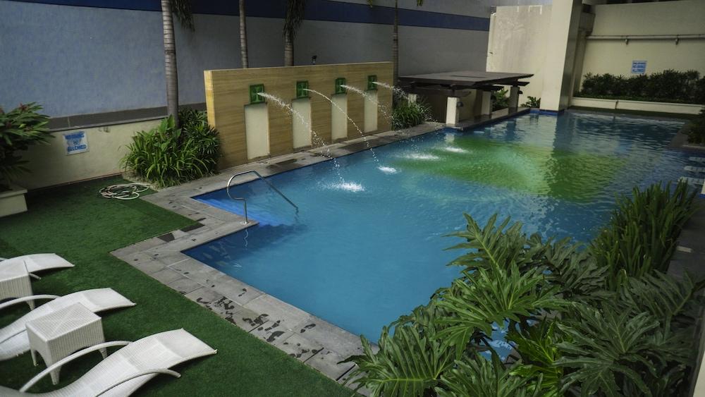 Pasig City فندق ذا إكستشانج ريجنسي ريزدنس مانجيد باي هيل المظهر الخارجي الصورة