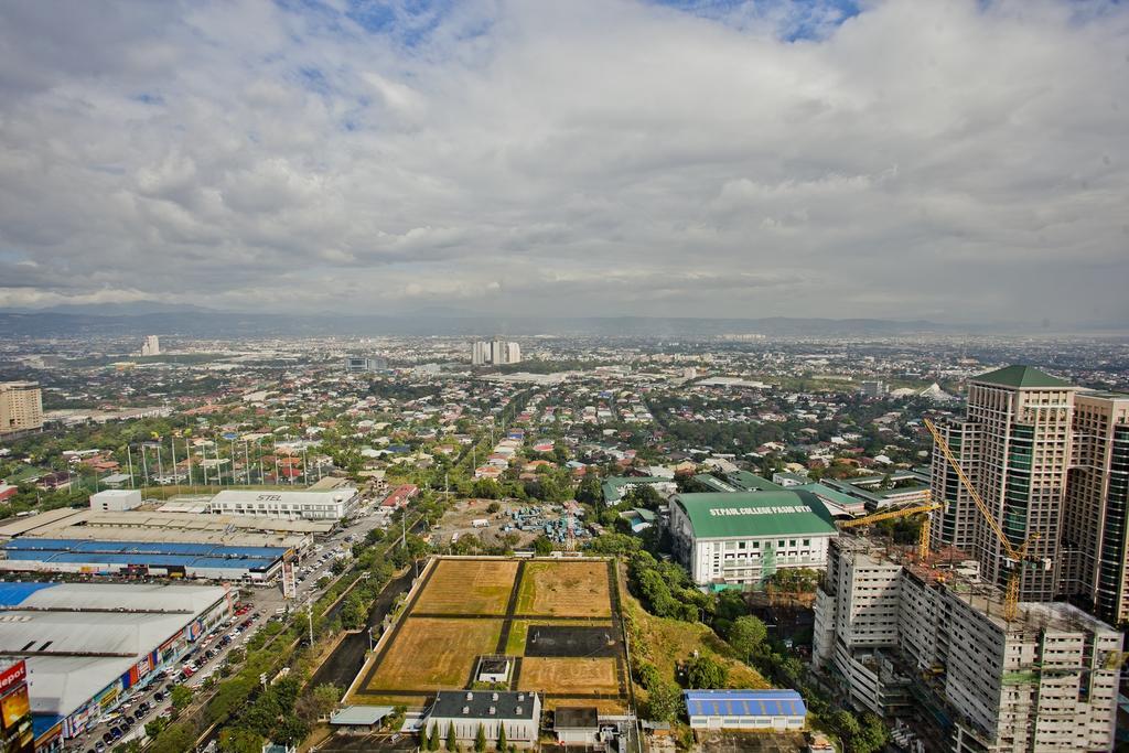 Pasig City فندق ذا إكستشانج ريجنسي ريزدنس مانجيد باي هيل المظهر الخارجي الصورة